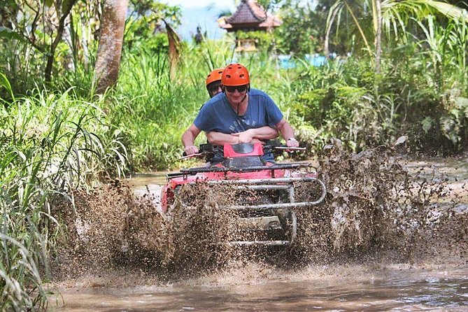 Ayung River Rafting and Tandem ATV Ride - Bali Skutis Adventure ATV: tandem riding through rice fields, mud, and small water surprises