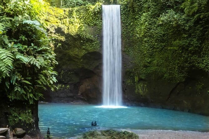 Bali: Best Eastern Waterfalls with Private Bali Tours - Kanto Lampo Waterfall: stacked-rock views with a classic Bali flow