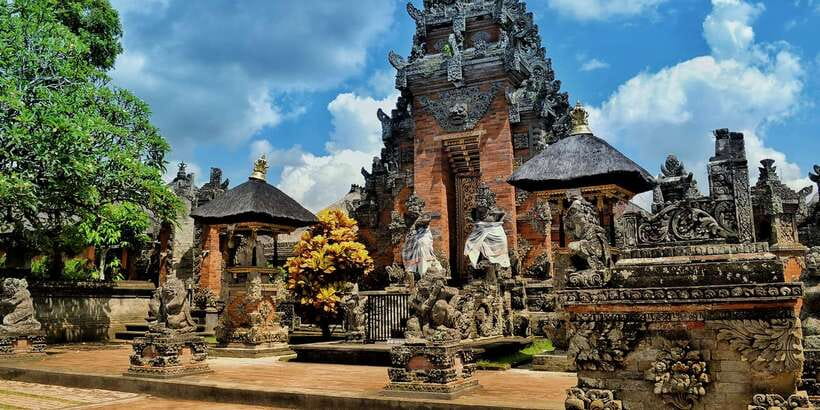 Bali: Ubud Waterfall, Village and Pool Club Day Trip - Batuan Temple (11th Century): Stone Carvings and Local Upkeep