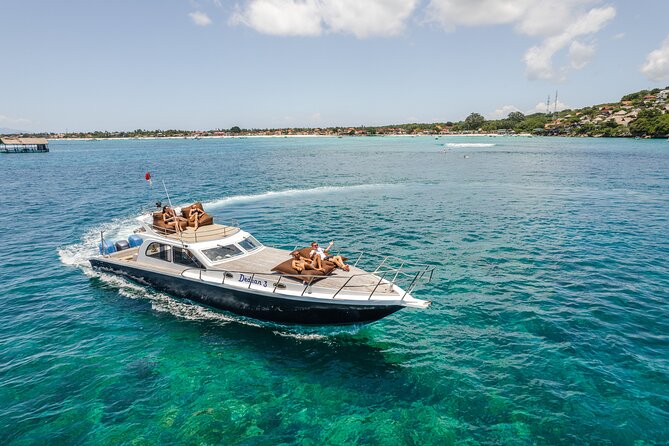 Full Day Nusa Penida by Honey Milk Yacht 13 meters - Kelingking Cliff car tour plus lagoon cruising: land views without the crowds