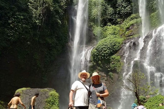 Full Day Private Tour All Inclusive Hidden Gems Bali Waterfall - Kanto Lampo’s tilted stone steps and clear water