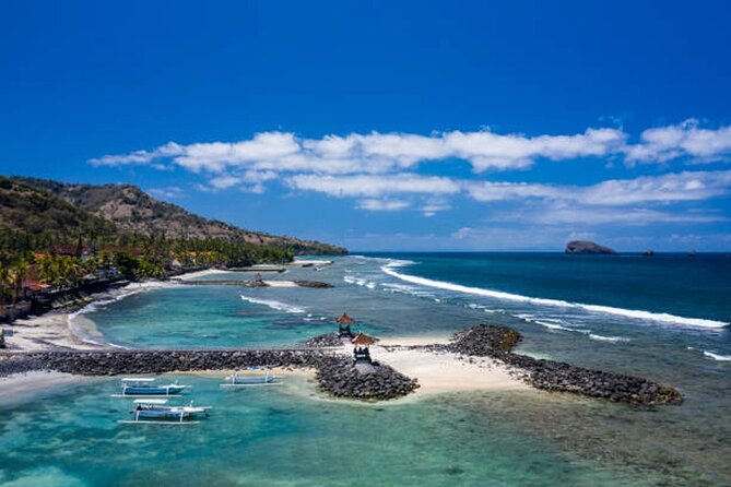 Full Day Private Tour East Bali Sightseeing - All Inclusive - Taman Ujung Water Palace: pools with a Mount Agung backdrop