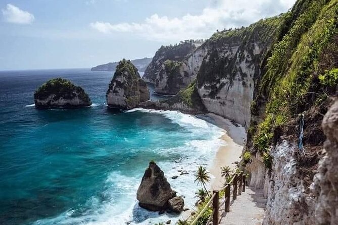 Nusa Penida East And West Full Day Private Guided Tour - Atuh Beach: clear water, high cliffs, and quick photo windows