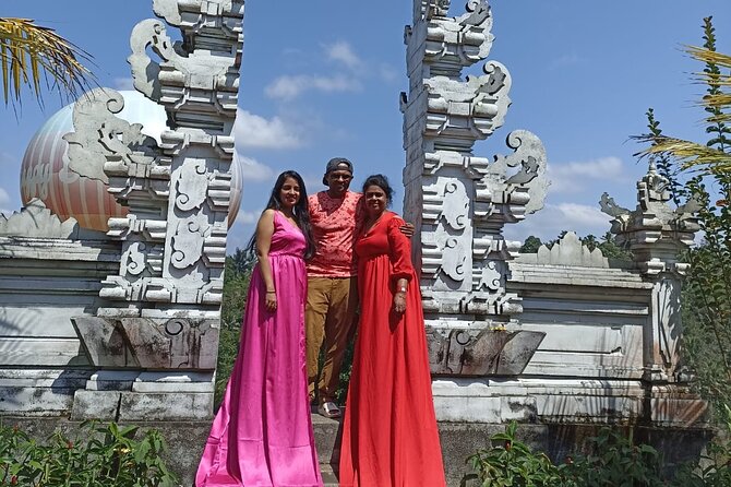 Ubud Tirta Empul Temple Swing And Waterfall Private Guided Tour - Sacred Monkey Forest: Rainforest Vibes and a Little Wish-Paying